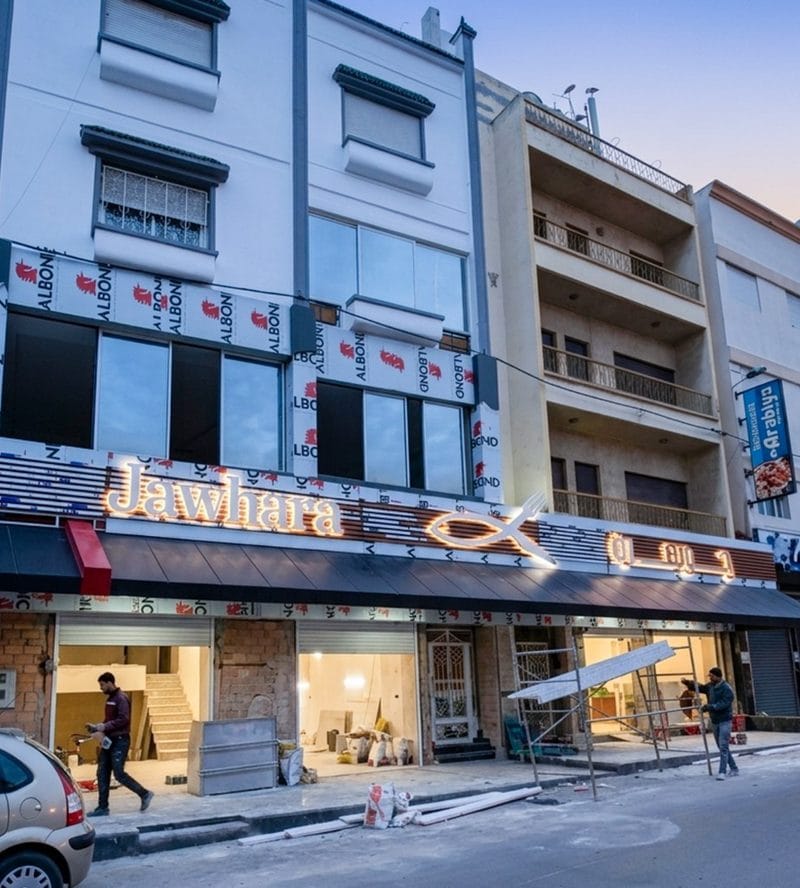 Habillage façade Albond Jawhara commerce - Enseigne LED et panneaux Alucobond Tanger