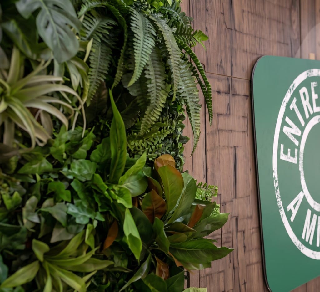 Living wall and Entreprise à mission stamp — office interior branding in Morocco, AdKey Signs